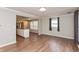 Open-concept living area flowing into the kitchen with lots of natural light at 916 S Outer Dr, Lebanon, IN 46052