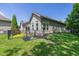 Well-maintained backyard with green grass, tidy landscaping, and black aluminum fencing at 9789 Rue Renee Ln, McCordsville, IN 46055