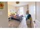 Cozy bedroom with bright decor, soft carpeting, and natural light from a large window at 9789 Rue Renee Ln, McCordsville, IN 46055