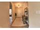 Inviting entryway with neutral walls, decorative table, and eye-catching rug at 9789 Rue Renee Ln, McCordsville, IN 46055
