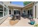 Backyard patio featuring outdoor seating and multiple access points into the home at 9789 Rue Renee Ln, McCordsville, IN 46055