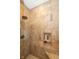Tiled shower with a niche, multiple shower heads, and designer tile accents at 9789 Rue Renee Ln, McCordsville, IN 46055
