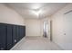 Bedroom with neutral carpet and stylish black accent wall at 10266 Hatherley Way, Fishers, IN 46037