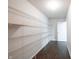 Walk-in pantry offers substantial storage with wire shelving at 10266 Hatherley Way, Fishers, IN 46037