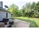 Outdoor patio with outdoor furniture and a lovely view of the backyard at 10266 Hatherley Way, Fishers, IN 46037