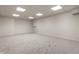 Unfinished basement with carpet and recessed lighting, perfect for customization at 10554 Hyde Park, Carmel, IN 46032