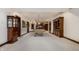 Spacious basement with carpeted floors and a pool table, perfect for entertaining guests at 10554 Hyde Park, Carmel, IN 46032