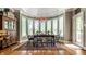 Dining room featuring hardwood floors, lots of natural light, and seating for six at 10554 Hyde Park, Carmel, IN 46032