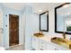 Bathroom featuring double vanity with gold vessel sinks at 10906 Camden Ct, Fishers, IN 46038