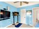 Bedroom featuring a standing desk and wall mounted TV, creating a flexible and modern workspace at 10906 Camden Ct, Fishers, IN 46038