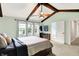 Comfortable main bedroom featuring a TV, access to a bath, and lots of natural light at 10906 Camden Ct, Fishers, IN 46038