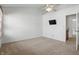 Bedroom with a ceiling fan and access to a walk-in closet at 1111 Cavendish Dr, Carmel, IN 46032