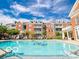 Inviting community pool with ample lounge chairs and beautifully landscaped surroundings at 1111 Cavendish Dr, Carmel, IN 46032