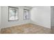 Bright room featuring tile flooring and two windows with natural blinds at 1111 Cavendish Dr, Carmel, IN 46032