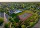 Community amenities include a pool, playground, tennis court, basketball courts, and a clubhouse, all in a lush setting at 11727 Wedgeport Ln, Fishers, IN 46037