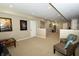 Spacious finished basement area with neutral carpet, recessed lighting and movie decor at 11727 Wedgeport Ln, Fishers, IN 46037