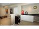 Finished basement features a bar area, movie posters and beige carpet at 11727 Wedgeport Ln, Fishers, IN 46037