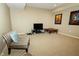 Basement features neutral carpet, recessed lighting and seating area at 11727 Wedgeport Ln, Fishers, IN 46037