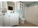 Clean bathroom features a vanity, mirror, toilet and shower-tub combo for convenience at 11727 Wedgeport Ln, Fishers, IN 46037