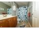 Cozy bathroom with a shower curtain, vanity, and blue accents at 11727 Wedgeport Ln, Fishers, IN 46037