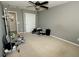 Spacious bedroom with a ceiling fan and walk-in closet, perfect for customization at 11727 Wedgeport Ln, Fishers, IN 46037