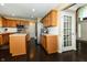 Bright kitchen showcasing wooden cabinets, stainless steel appliances, and ample counter space at 11727 Wedgeport Ln, Fishers, IN 46037