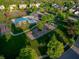 Community amenities include a playground, pool, tennis court, basketball court, and a clubhouse, all in a lush setting at 11727 Wedgeport Ln, Fishers, IN 46037