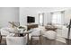 Bright living room featuring a glass table, hardwood floors and natural light at 1216 N Alabama St, Indianapolis, IN 46202