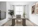 Bright, modern office space with stylish desk, large window and ample natural light at 1216 N Alabama St, Indianapolis, IN 46202