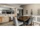 Open floorplan eat-in kitchen and dining area with a view into living space at 12328 Slate Dr, Fishers, IN 46037