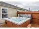 Private hot tub offers a secluded retreat for relaxation and enjoyment in a serene backyard setting at 12328 Slate Dr, Fishers, IN 46037