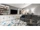 Spacious living room with a built-in entertainment center and comfortable sectional sofa at 12328 Slate Dr, Fishers, IN 46037