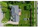 Aerial view of a home highlighting the spacious backyard, deck, and mature trees at 13868 Broad Mdw, Carmel, IN 46032