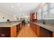 Spacious kitchen with granite countertops, custom cabinetry, and modern appliances at 13868 Broad Mdw, Carmel, IN 46032