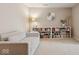 Cozy living room with a comfortable couch and built-in bookshelves at 13868 Broad Mdw, Carmel, IN 46032