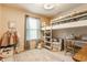 ' bedroom with bunk beds, carpeted floors, and a light-filled window, a cozy space for children at 14291 Holly Berry Cir, Fishers, IN 46038
