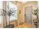 Inviting foyer with hardwood floors, a large window, and stylish decor at 14291 Holly Berry Cir, Fishers, IN 46038