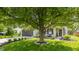 Beautiful home with a large tree, well-kept lawn, and inviting curb appeal at 14291 Holly Berry Cir, Fishers, IN 46038