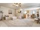 Open-concept living room featuring stylish furnishings and a view of the kitchen at 14291 Holly Berry Cir, Fishers, IN 46038