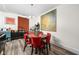 Bright dining room featuring a large painting and seating for six at 1446 N Illinois St, Indianapolis, IN 46202