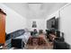 Relaxing basement living room with a large TV and cozy seating area at 1446 N Illinois St, Indianapolis, IN 46202