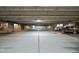 This parking garage is spacious with numbered spaces and concrete pillars at 1446 N Illinois St, Indianapolis, IN 46202