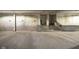 Spacious parking garage with marked spaces and stairs leading to the building at 1446 N Illinois St, Indianapolis, IN 46202