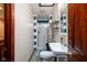 Bathroom features a stand up shower with white fixtures and a wooden door at 16226 Montrose Ln, Westfield, IN 46074