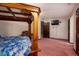 Bedroom with a four-poster bed, television, overhead lighting, and closet at 16226 Montrose Ln, Westfield, IN 46074