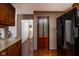 View of kitchen with tile floor and hallway leading to ornate vase in this well-maintained home at 16226 Montrose Ln, Westfield, IN 46074
