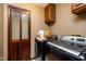 Laundry room with cabinet space and folding doors on wall at 16226 Montrose Ln, Westfield, IN 46074