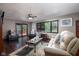 Inviting living room boasts a cozy atmosphere with plush seating, hardwood floors, and a beautiful window at 16226 Montrose Ln, Westfield, IN 46074