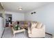 Cozy living room featuring a large sectional sofa, a coffee table, and neutral decor at 16226 Montrose Ln, Westfield, IN 46074