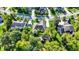 Aerial view of single-Gathering homes surrounded by mature trees and green lawns, located on a tree-lined street at 16890 Catkins Ct, Westfield, IN 46074